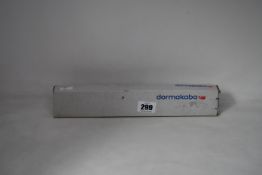 A boxed Dormakaba concealed fire door closer (PN: ITS 96).