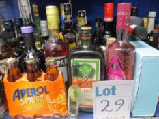 A quantity of alcohol to include rums, vodkas and liqueurs including: Grey Goose, Captain Morgan'