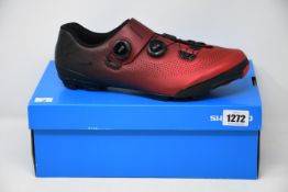 A pair of boxed as new Shimano SH - XC701 large wide red (Size EUR 46) cycling shoes.
