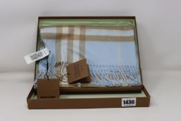 A boxed as new Burberry Giant Check Cashmere Scarf in pale blue and beige.