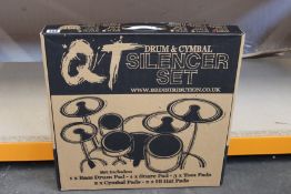 Two as new QT drum and cymbal silencer sets and an as new Vic Firth Vic drum mutes.