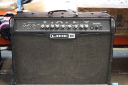 A pre-owned Line6 Spider IV 120 guitar amplifier.