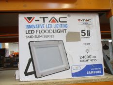 Three boxed V-Tac VT-300 Floodlights.