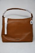 An as new Michael Kors Lexington bag in brown.