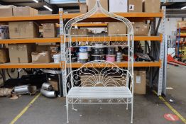 A seven foot white two seater metal rose arch garden seat.