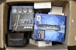 A box of assorted grooming care items to include shavers and trimmers (Approximately 15 items).