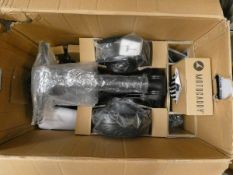A boxed Motocaddy M5GPS electric golf trolley.