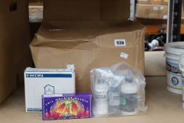 An assortment of various tattoo equipment, inks and related items to include Killer Ink precision