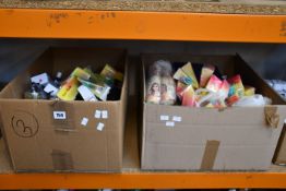 Two boxes of assorted as new beauty products and related items.