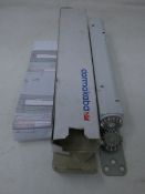 A boxed Dormakaba concealed fire door closer (PN: ITS 96).
