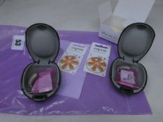 Two as new Signia Motion 13 hearing aids (PN: 5NX DKC) (One boxed, one with protective case only)