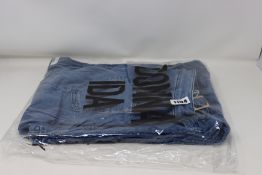 A pair of as new Donna Ida Minnie The High Top Flare jeans (W31 - RRP £215).