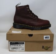 A pair of as new Dr Martens 101 Unbound 6 eyelet boots (UK 9).