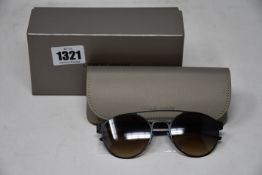 A pair of as new boxed Giorgio Armani Steel Man sunglasses.