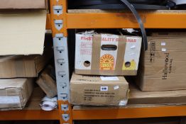 A large quantity of miscellaneous flatpack furniture and related items.