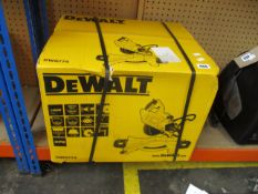 A boxed as new DeWalt DWS774 Slide Mitre Saw.