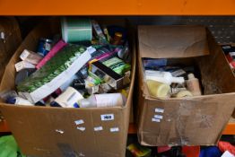 A box of assorted as new/part used toiletries and beauty items.