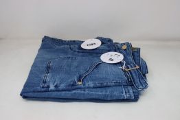 A pair of as new Donna Ida Minnie The High Top Flare jeans (W27 - RRP £215).
