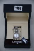 A ladies boxed as new Longines PrimaLuna 30mm watch in silver (RRP £1190).
