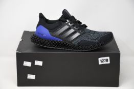 A pair of as new Adidas Ultra4D trainers (UK 9).
