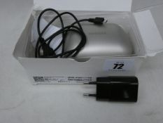 A boxed Phonak Marvel Charger Case Combi compatible with Marvel, Belong & Paradise Hearing Aids (