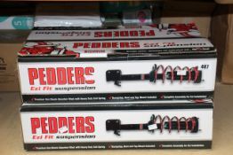 Four boxed Pedders Ezi Fit Suspension premium gas shock absorbers with heavy duty coil spring (