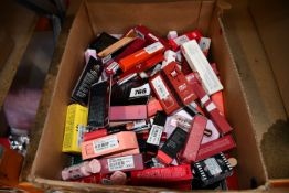 A quantity of assorted lipsticks and lip tints with related items (Approximately 80 items).