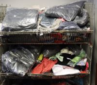 A quantity of as new clothing and related items.