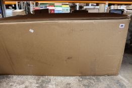 A boxed Balsam Hill 5ft balsam fir pre-lit Christmas tree.