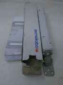 A boxed Dormakaba concealed fire door closer (PN: ITS 96).