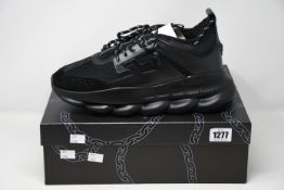 A pair of as new Versace Chain Reaction sneakers (Size 445 - RRP £770).