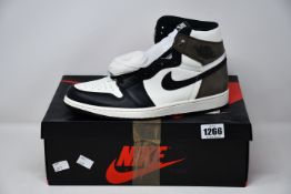 A pair of as new Nike Air Jordan 1 Retro High OG (UK 9).
