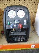 A Javac XTR-Pro Dual Voltage Refrigerant Recovery Machine.