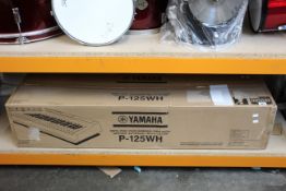 A boxed as new Yamaha P-125WH Electric Piano in white.