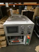 A pre-owned LCD Laminating Machine (Damaged).