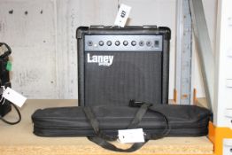 A pre-owned Glarry 32-Key Melodica with mouthpiece with a hose and bag and a pre-owned Laney