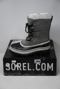 A pair of as new Sorel Caribou boots (UK 4).