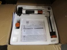 A boxed Evolution R210 SMS+ Sliding Mitre Saw.