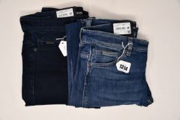 Two pairs of as new Hugo Boss jeans (W30/L32).