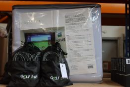 An as new Golf Bays Pro Impact Screen (400 x 300cm) with three bags of Golf Bays Bungee Cords.