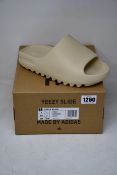 A pair of as new Adidas Yeezy Slide (UK 7).
