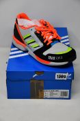 A pair of as new Adidas Irak ZX 8000 GTX trainers (UK 8).