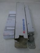 A boxed Dormakaba concealed fire door closer (PN: ITS 96).