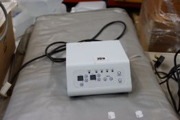 Two Lasersystem SCR-HBI-M1 hot blankets and a control unit.