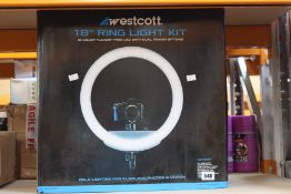 A boxed Westcott 18” bi-colour LED ring light kit.