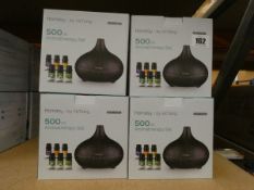 Nine boxed as new Homasy 500ml aromatherapy sets to include essential oils and diffusers.