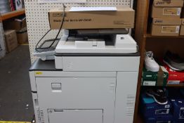 A Ricoh MPC2011SP multi function laser printer scanner, serial number G478M130299.