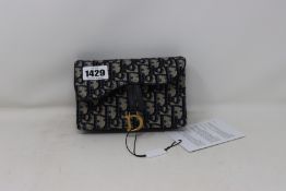 An as new Christian Dior Saddle Belt pouch.