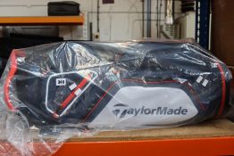 An as new TaylorMade Pro 8.0 Golf Cart Bag in blue and white.