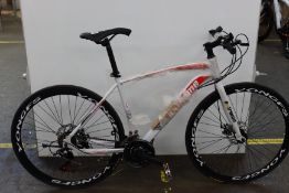 An Extreme mountain bike/racing bike, 27 speed with 18